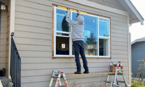 Staff installing windows