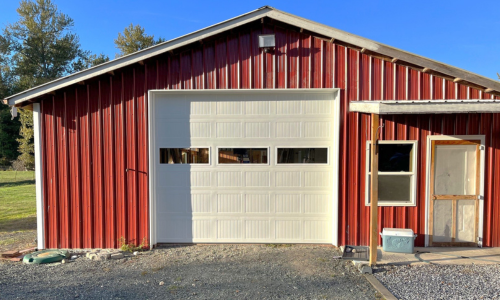 Garage door on a red garage